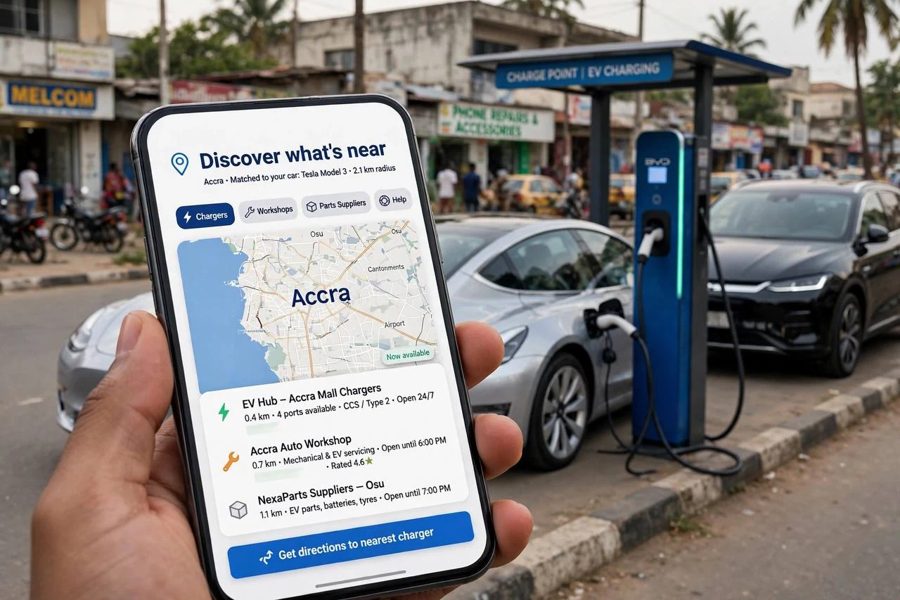 A hand holding a phone showing a map of nearby chargers, workshops and parts suppliers in Accra, with a car charging behind