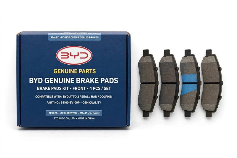 A carmaker-branded genuine brake pad set next to its box